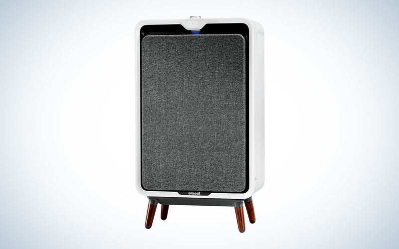 A Bissell air320 air purifier on a plain background